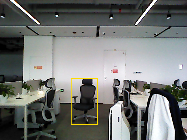 Same chair before manual movement in Trial 1R, with a yellow detection box.